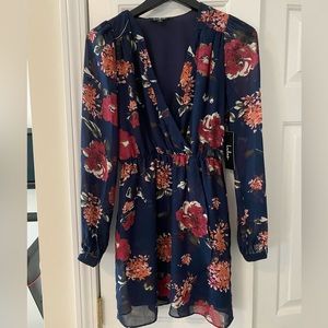 Long sleeve, navy floral dress. Never worn, tag still on. From lulus